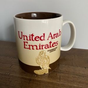 Various Starbucks location mugs